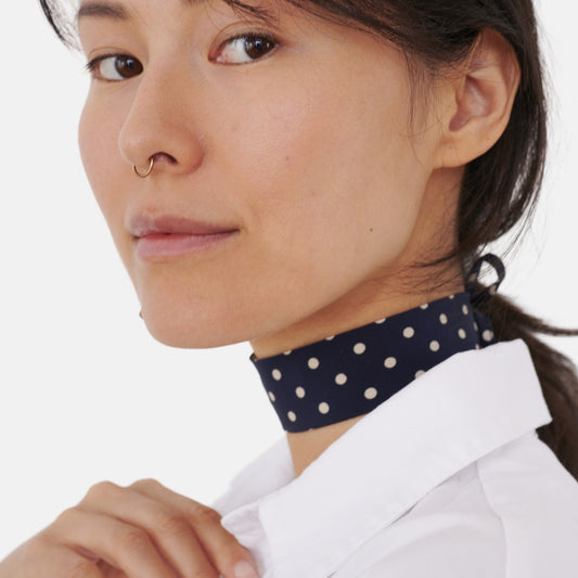 Model wearing the Navy Polka Dot Silk Choker – upcycled vintage silk tie | collo limited edition