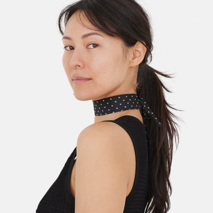 Model wearing the Black Star Silk Choker – upcycled vintage silk tie | collo limited edition