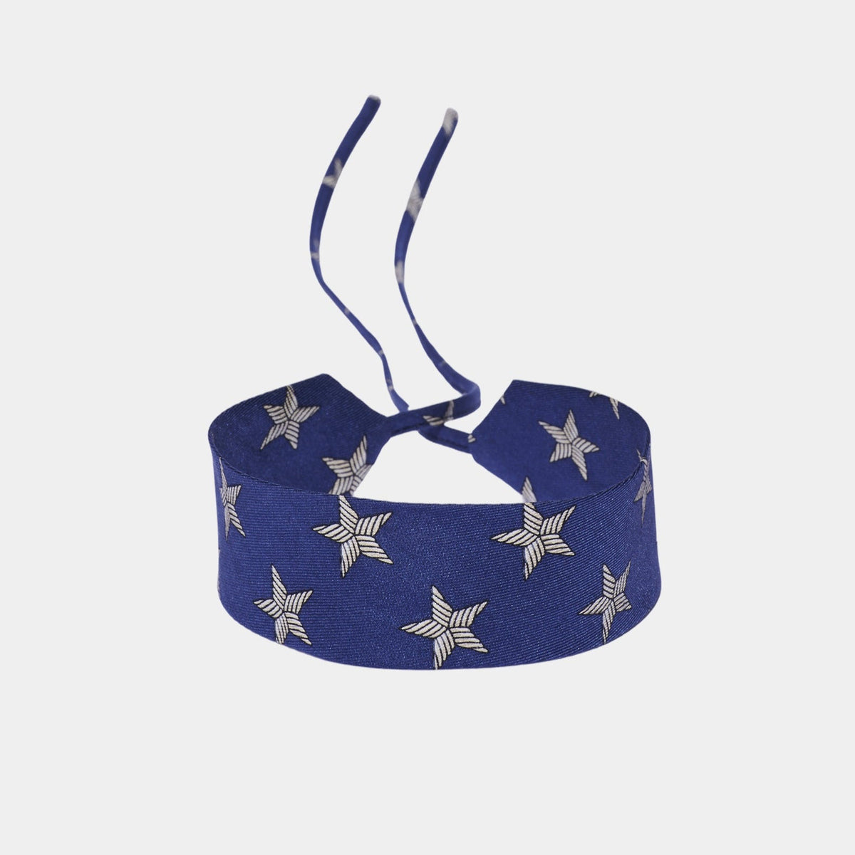 Blue silk choker with repeating white stars featuring striped detailing
