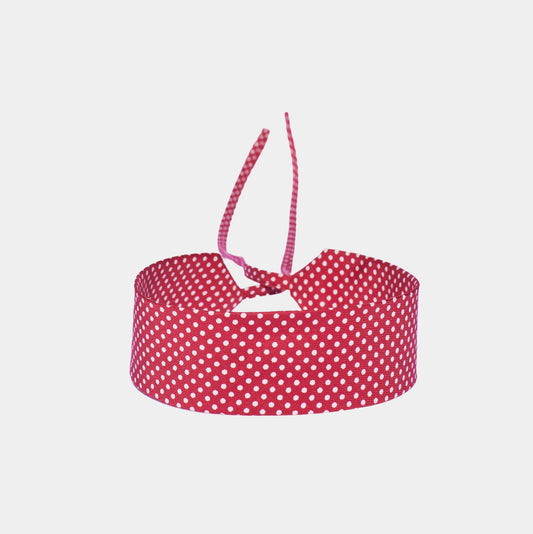 Bright red silk choker with a repeating white dot pattern