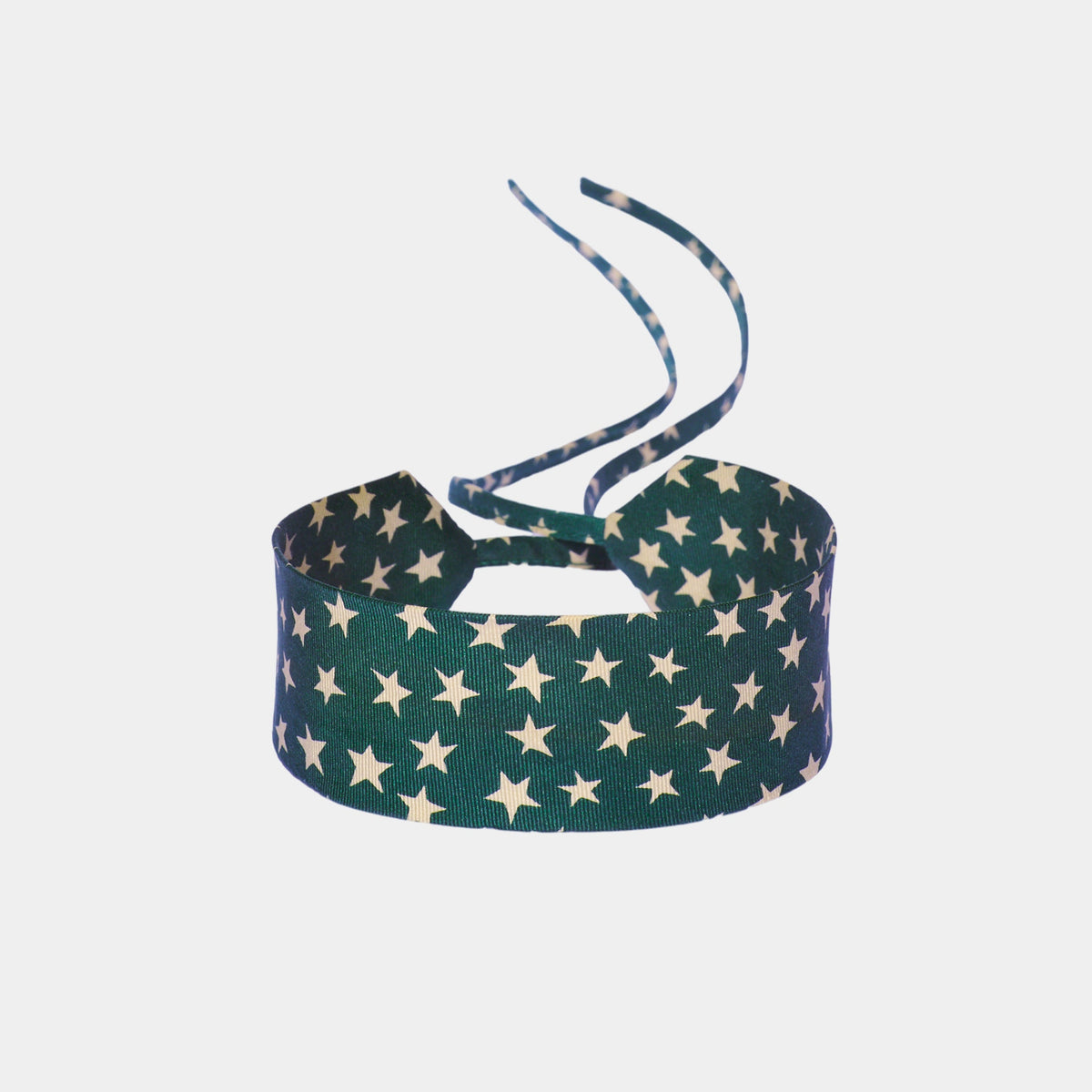 green silk choker with a repeating white star pattern
