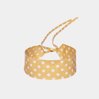 yellow silk choker with repeating white polka dots