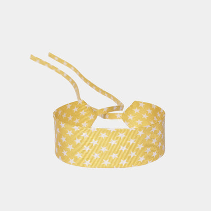 Bright yellow silk choker with a repeating white star pattern