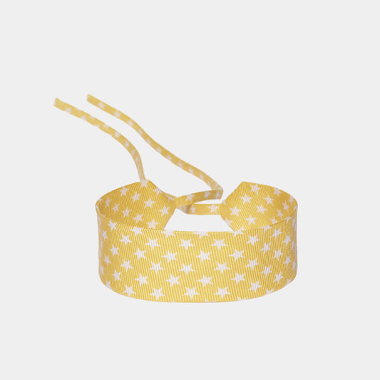Bright yellow silk choker with a repeating white star pattern