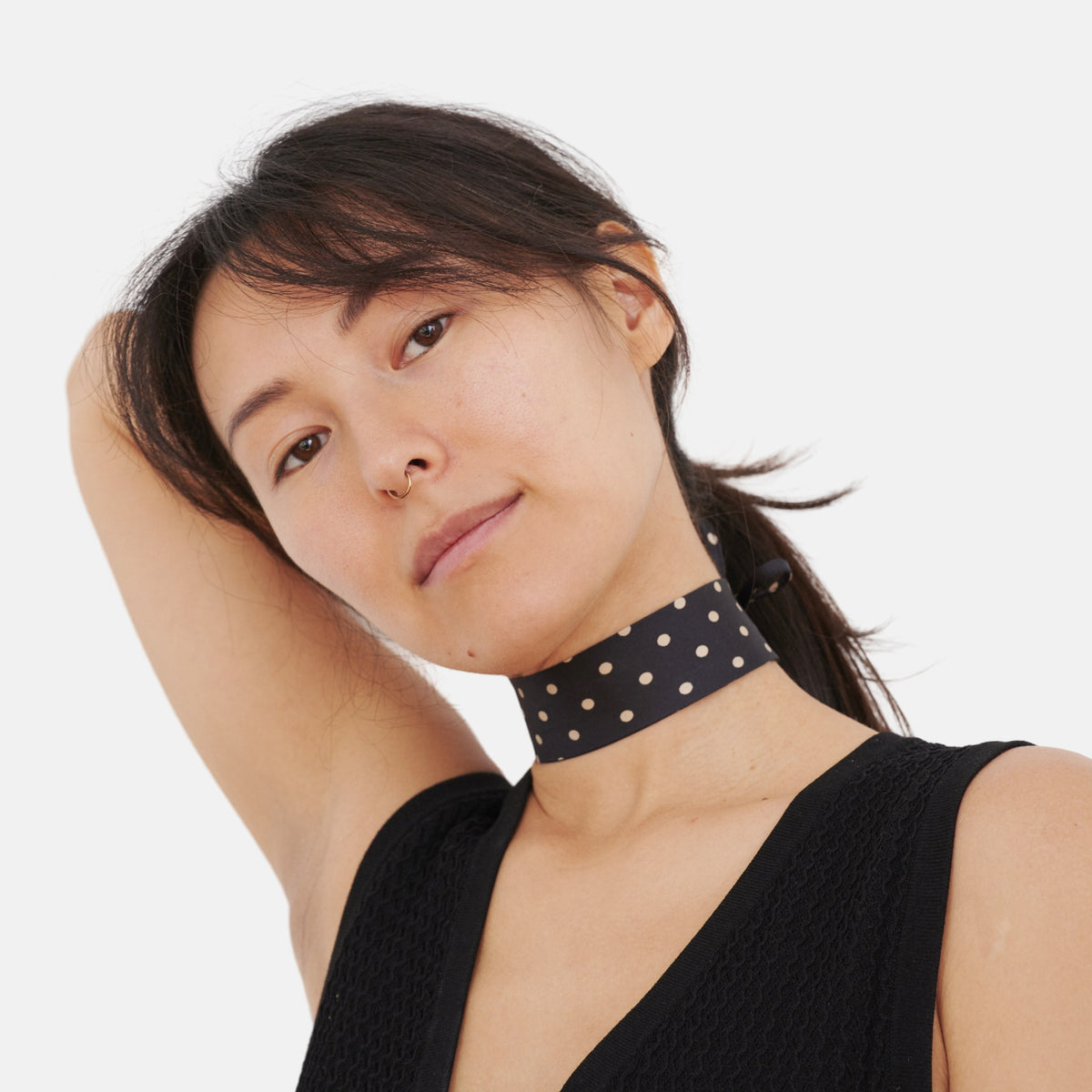Model wearing the Black Polka Dot Silk Choker – upcycled vintage silk tie | collo limited edition