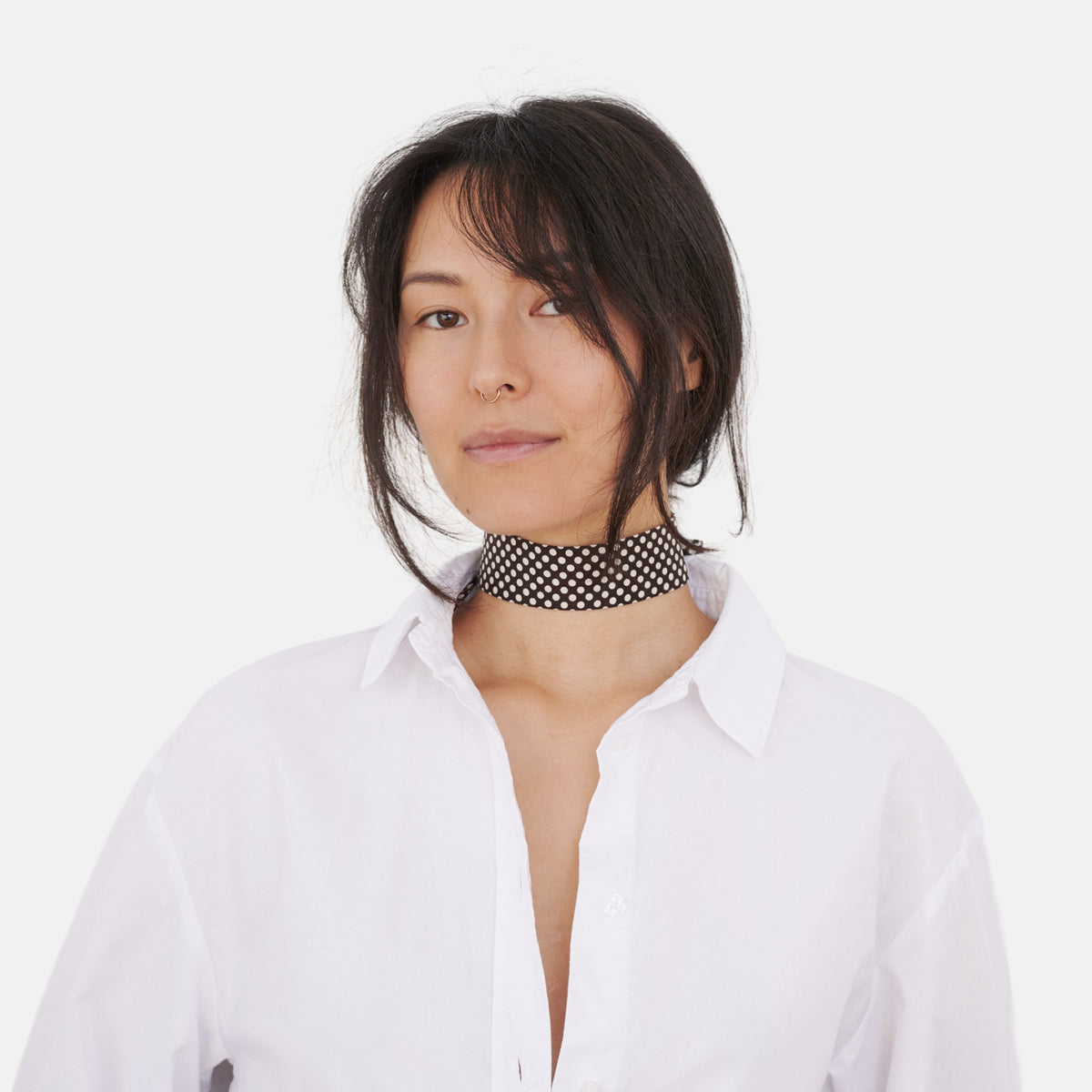 Model wearing the Chocolate Brown Polka Dot Silk Choker – upcycled vintage silk tie | collo limited edition