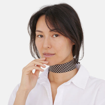 Model wearing the Chocolate Brown Polka Dot Silk Choker – upcycled vintage silk tie | collo limited edition