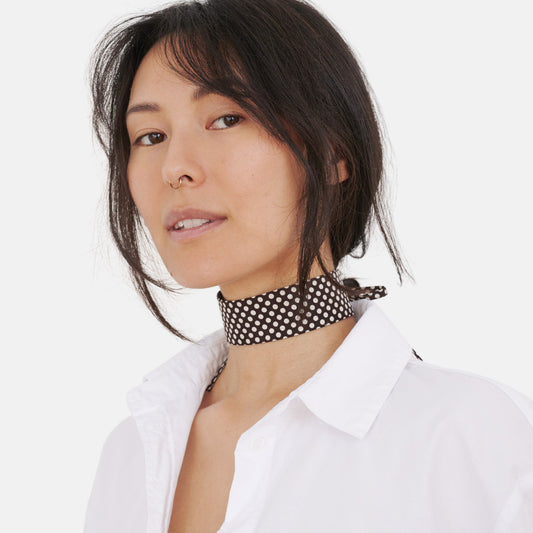 Model wearing the Chocolate Brown Polka Dot Silk Choker – upcycled vintage silk tie | collo limited edition