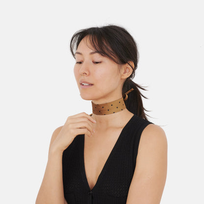 Model wearing the Golden Dotted Silk Choker – upcycled vintage silk tie | collo limited edition