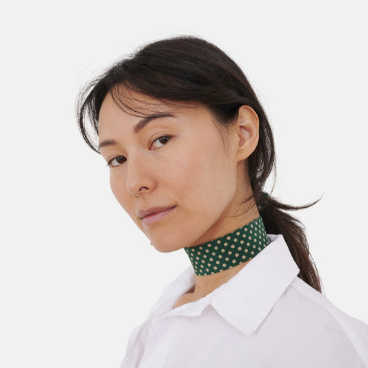 Model wearing the Green Polka Dot Silk Choker – upcycled vintage silk tie | collo limited edition