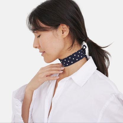 Model wearing the Navy Polka Dot Silk Choker – upcycled vintage silk tie | collo limited edition