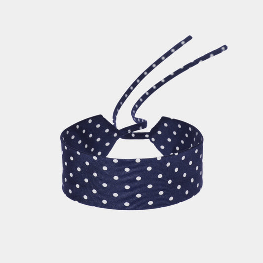 navy blue silk choker with a repeating white dot pattern