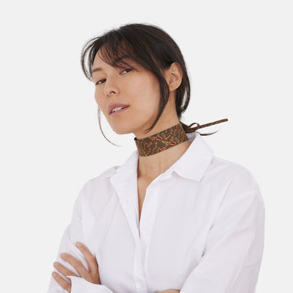 Model wearing the Olive Green Horsebit Silk Choker – upcycled vintage silk tie | collo limited edition
