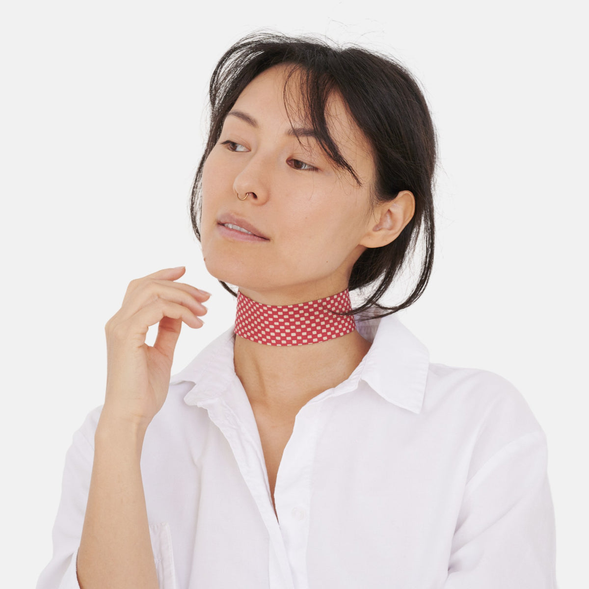 Model wearing the Red Checkerboard Silk Choker – upcycled vintage silk tie | collo limited edition