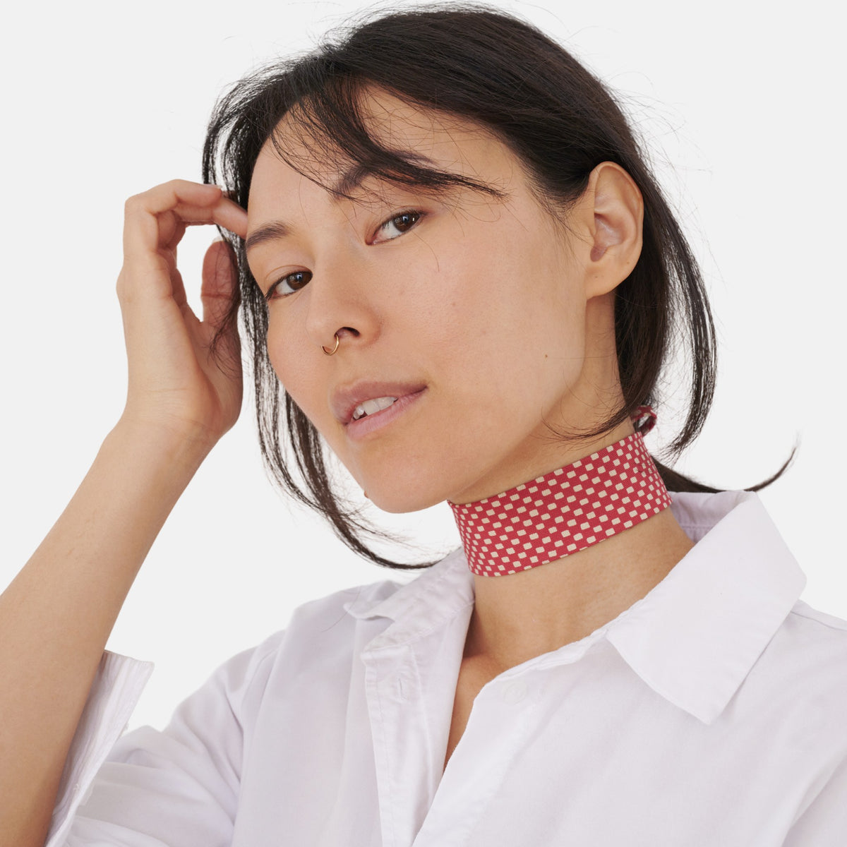 Model wearing the Red Checkerboard Silk Choker – upcycled vintage silk tie | collo limited edition