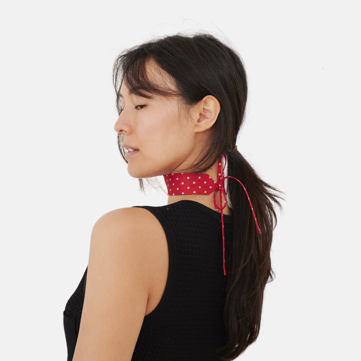 Model wearing the Red Polka Dot Silk Choker – upcycled vintage silk tie | collo limited edition