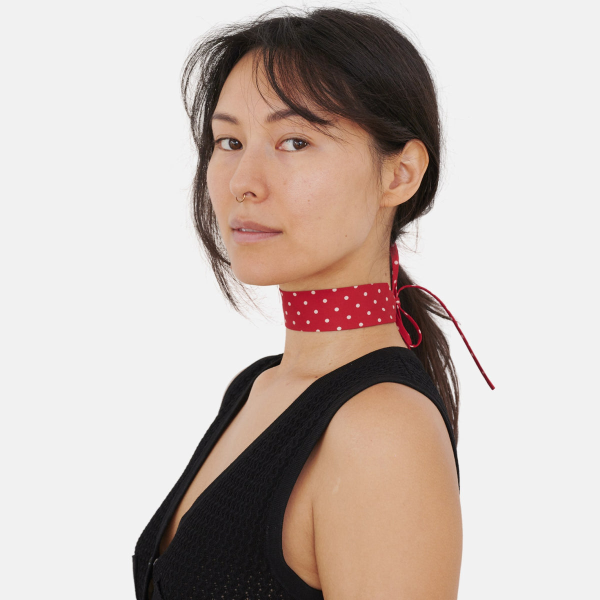Model wearing the Red Polka Dot Silk Choker – upcycled vintage silk tie | collo limited edition