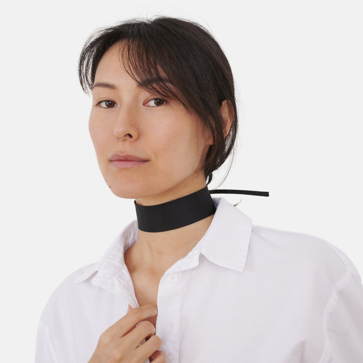 Model wearing the Solid Black Silk Choker – upcycled vintage silk tie | collo limited edition