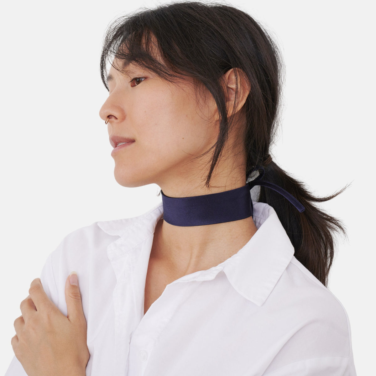 Model wearing the Solid Navy Silk Choker – upcycled vintage silk tie | collo limited edition