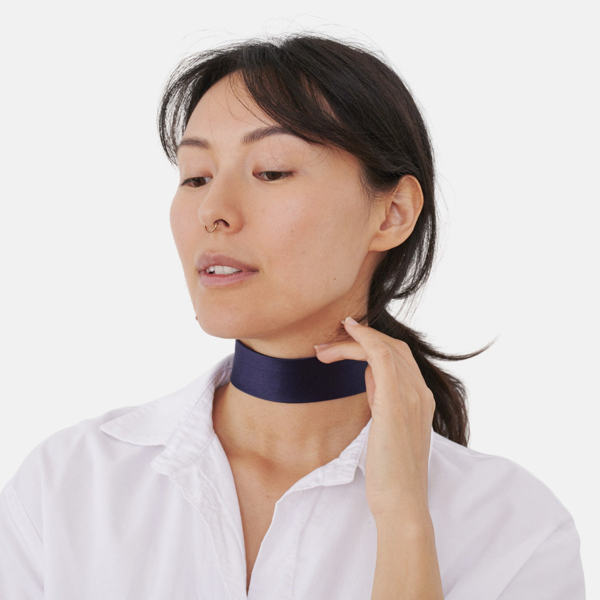 Model wearing the Solid Navy Silk Choker – upcycled vintage silk tie | collo limited edition