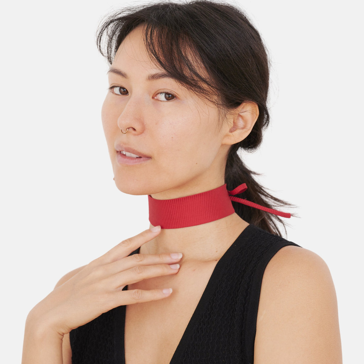Model wearing the Solid Red Rib Silk Choker – upcycled vintage silk tie | collo limited edition